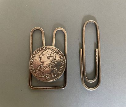 null Lot of two silver money clips, one in the shape of a paper clip, 

the other...