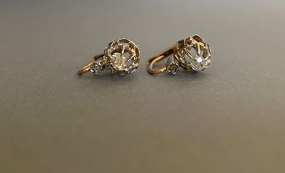 null Pair of sleepers set with a cushion-shaped old-cut diamond under a rose-cut...