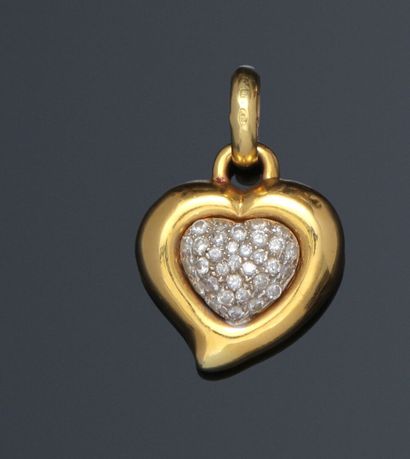 Heart-shaped pendant in yellow gold, the...