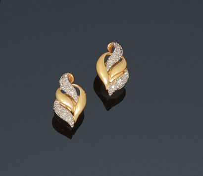 Pair of two gold flamed stud earrings, each...