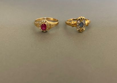 null Lot of two yellow gold rings :

 one antique with an oval ruby surrounded by...