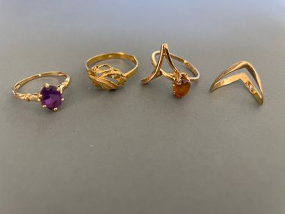 Lot of four yellow gold rings, two of which...