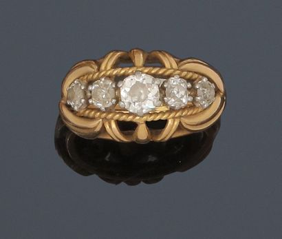 Ring decorated with a line of five old cut...