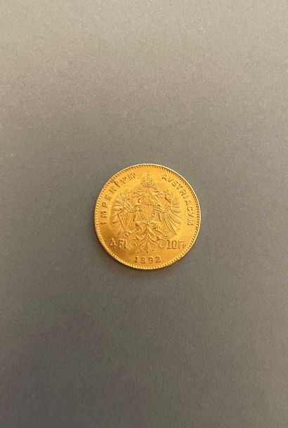 null Monnaie autrichienne en or de 10 francs à l’effigie de

François Joseph, année...