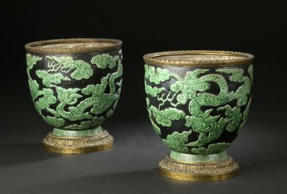null 
CHINA - 19th century




Pair of porcelain pots with green relief molded decoration...