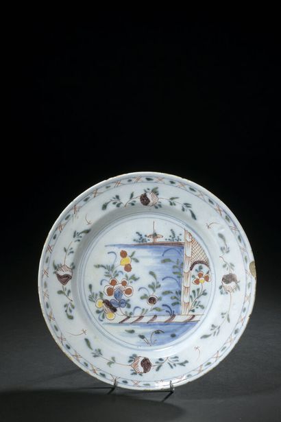 Delft

Round earthenware dish with polychrome...