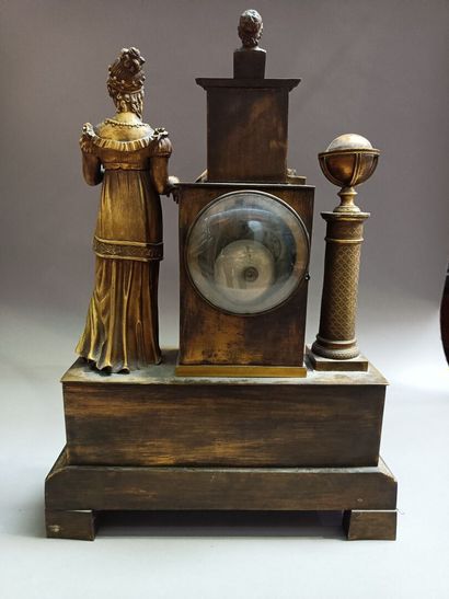 null Gilt bronze clock with a library, flanked by a young woman reading. 

Restoration...