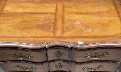 null 
Stained wood chest of drawers, the front in crossbow, opening to four drawers...
