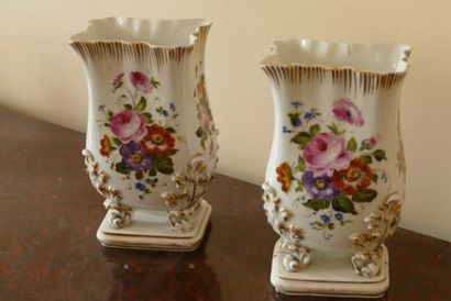 null 
Two church vases in porcelain of Paris enamelled polychrome flowers. 




Middle...