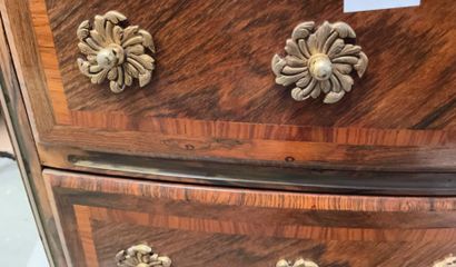 null 
Chest of drawers with curved front in rosewood veneer opening to four drawers,...