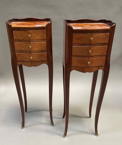 null Pair of bedside tables in inlaid veneer opening to three drawers, cambered weights,...