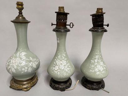 Pair of celadon porcelain oil lamp and lamp...