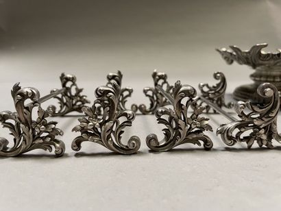 null A pair of silver display stands with a rocaille design (H5,5 cm),

Nine silver...