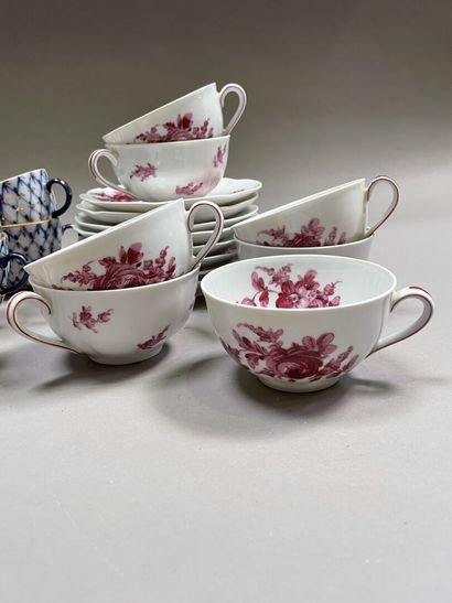null Two parts of porcelain tea services:

-One Russian with blue and gold trellis...