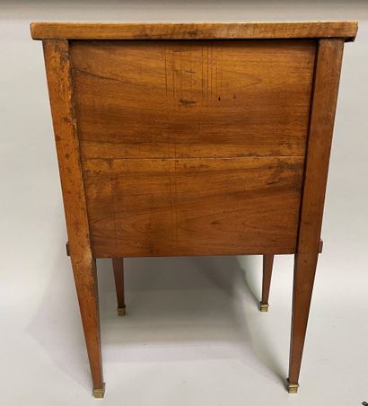 null Small molded wood table opening with three drawers, sheath legs.

Louis XVI...