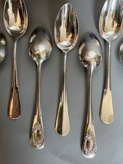 null 
Twelve silver coffee spoons with medallion design in a flowery cartouche.

Weight...