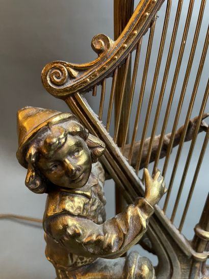 null 
Pied de lampe en bronze doré "Jeune harpiste"

Signé au dos Georges OMER

H...