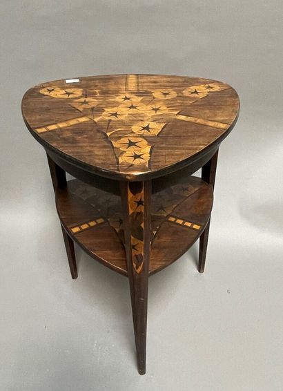 Triangular pedestal table in stained wood...