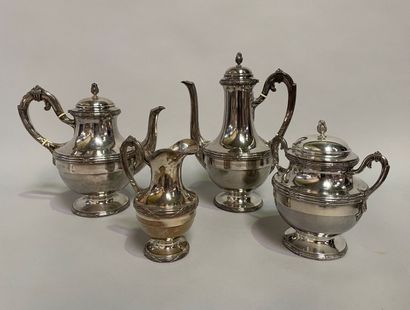 null Silver tea and coffee set with net and ribbon decoration including: teapot,...