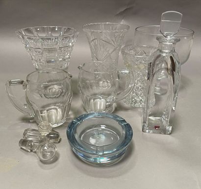 null Crystal lot including: vases, jugs, crystal and suede carafe, ashtray.

Decanter:...