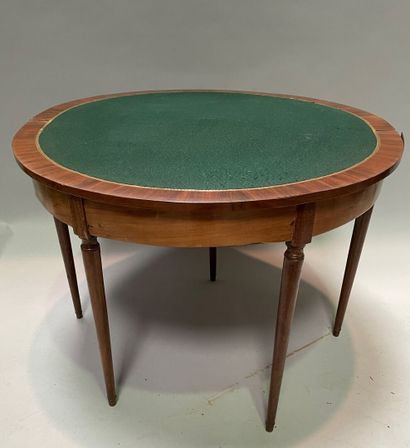 
Half-moon table with shutter, on five tapered...