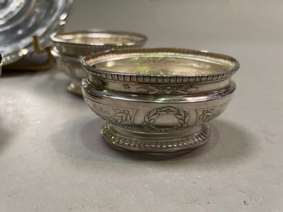 null Silver lot including: six coasters with wavelets, three poly-lobed dishes, a...