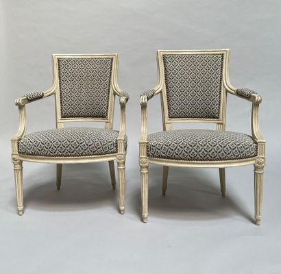 Four armchairs in molded and carved wood,...