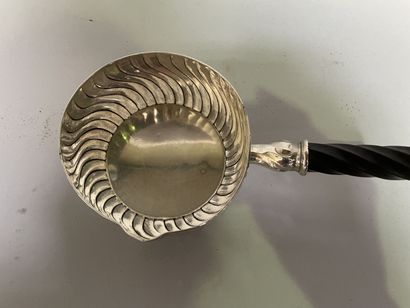 null Small saucepan with twisted gadroon patterns, the handle in blackened turned...