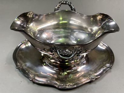 null Silver lot including: sauceboat with adherent tray decorated with leaves, numbered,...