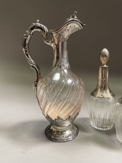 null Lot mounted silver including: ewer (28 cm), carafes (28.5 cm), two pairs of...