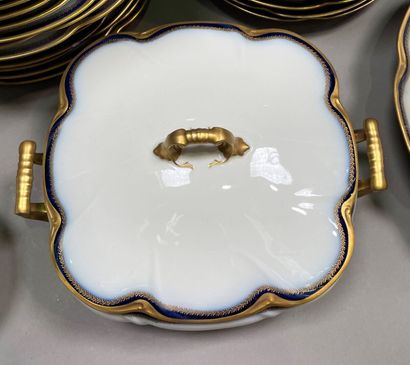 null Part of table service in porcelain with blue and gold decoration including:...