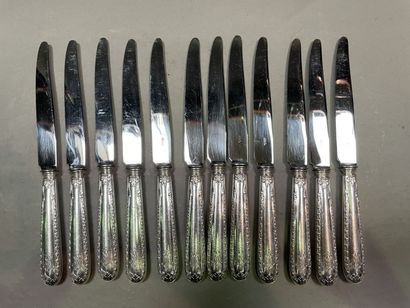  Twelve large knives the handle out of silver...