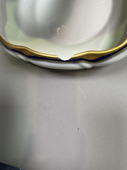 null Part of table service in porcelain with blue and gold decoration including:...