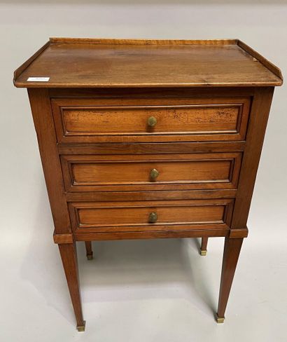 null Small molded wood table opening with three drawers, sheath legs.

Louis XVI...