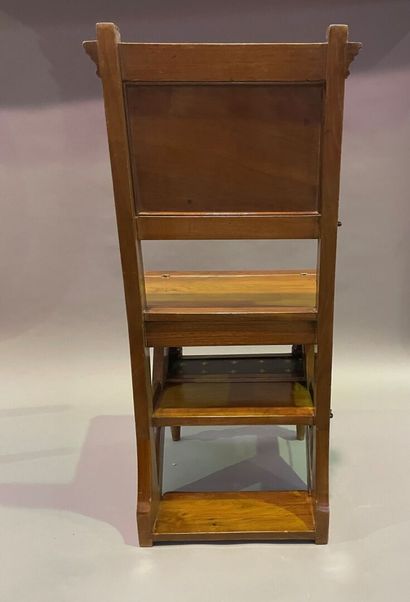 null Chair forming a library stool in mahogany, the steps trimmed with green leather...