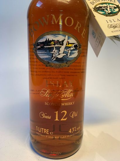 null 2 bouteilles de BOWMORE de 1 Litre :

- 12 Years Single Malt Scotch Whisky,...