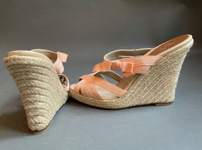 null Christian LOUBOUTIN 

Pair of rope and salmon grosgrain wedge mules. 

Size...
