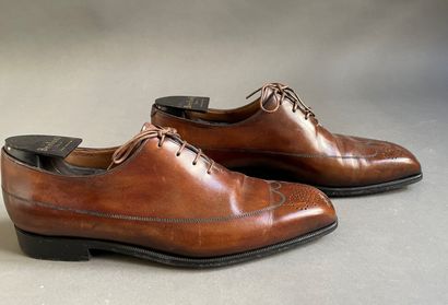 null BERLUTI

Pair of brown leather richelieu shoes, the end adorned with a perforated...