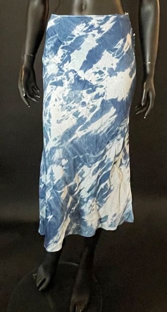 null Christian DIOR Boutique , Regina PARIS 

 Lot including a faded skirt in blue...