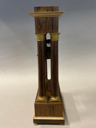 null Portico clock in inlaid rosewood veneer.

Charles X period. 

52 x 26 x 15 ...