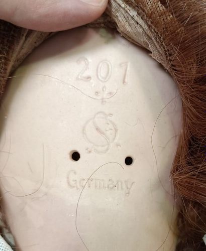 null 
Four dolls, the head in cookie, two with mobile eyes, marked "201 SO Germany",...