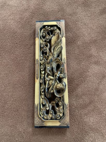 null 
Two pairs of decorative elements in carved and gilded wood. One with guanine...