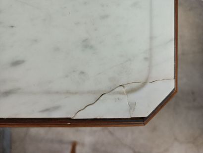 null Bedside table with five drawers and white marble top. 

Accidents notably on...