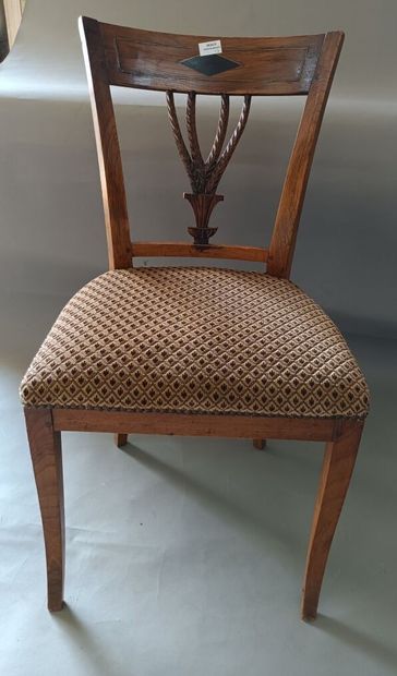 null 
Suite of nine chairs in natural wood, with openwork back of four strands the...