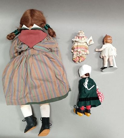 null 
Lot of five dolls, some with bisque head and closed mouth. 




Italian doll...