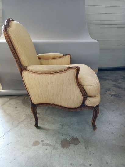 null Pair of armchairs upholstered in yellow fabric and framed in molded wood. 

Accidents.

94...