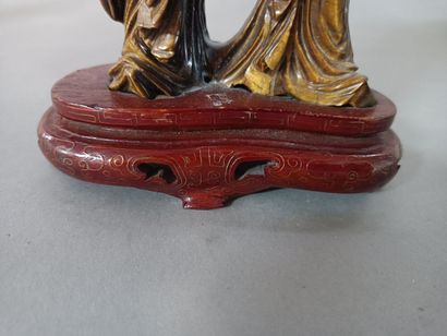 null 
Two young girls in agate eye of tiger carved. 




China, 20th century.




H...