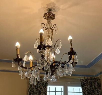 A six lights gilt bronze chandelier with...