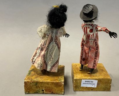null Two automatons in boiled cardboard representing a boy and a girl dancing the...