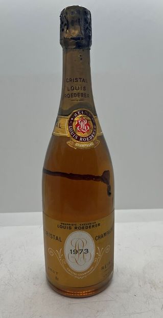 null 1 Champagne CRISTAL Roederer 1973, étiquette légèrement sale, coiffe sale et...